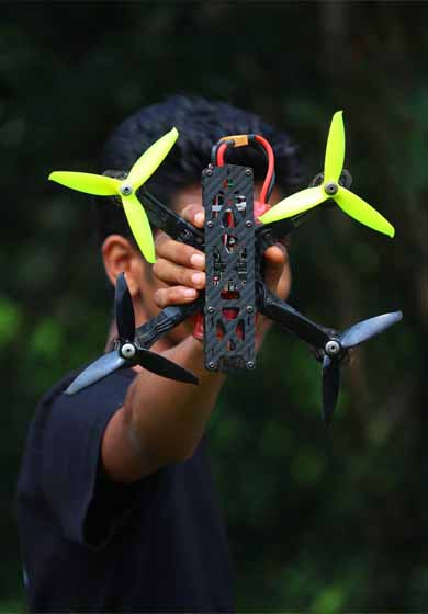 Young innovators building robotics projects at FAERI event